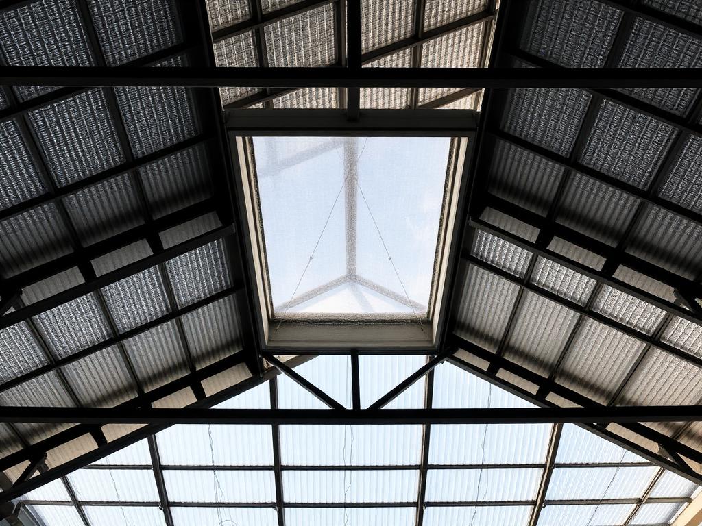 Translucent skylight roof panels lighting a steel building interior